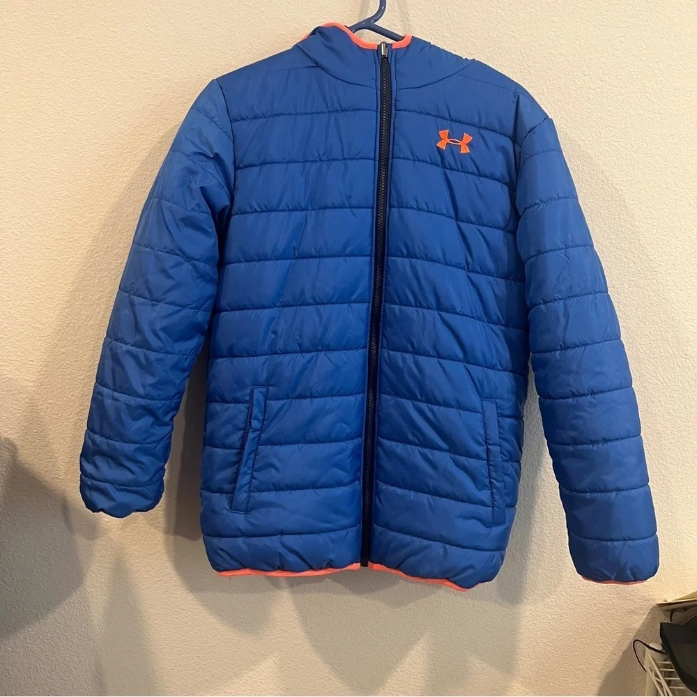 Under Armour kids size X-Large blue and orange reversible puffer jacket hooded